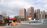 View of proposed tower blocks, many in the shadow of the next block to the south, seen above Cricklewood Station.